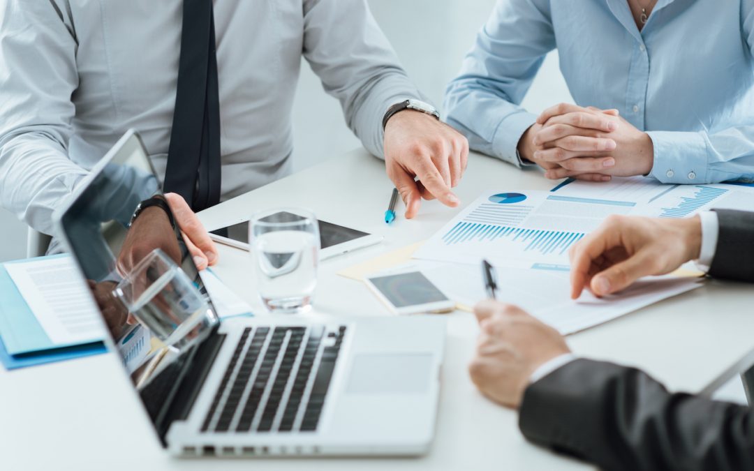 business owner reviewing LLC formation documents on a polished desk