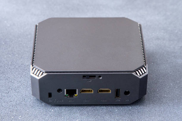 What are some popular brands and models of mini PCs for media centers?