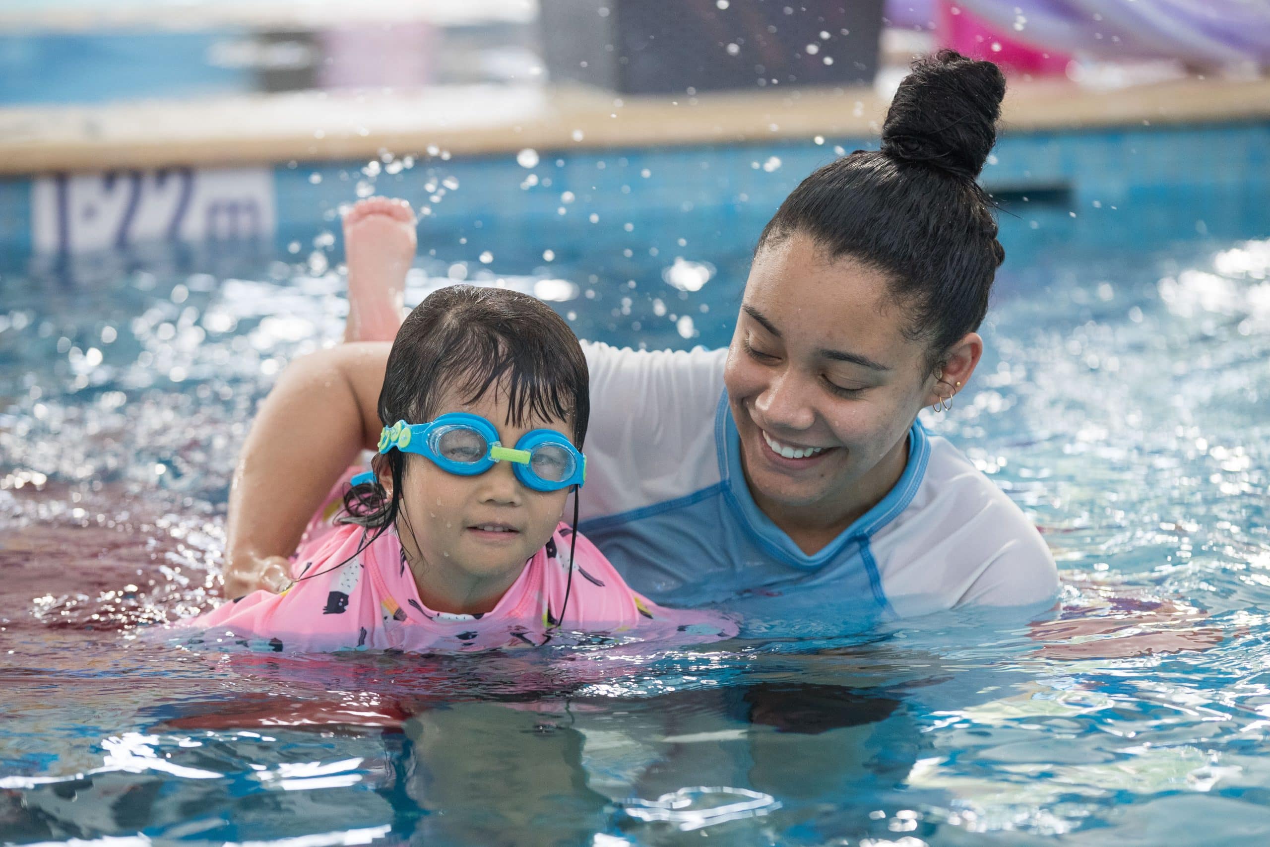 What are some popular techniques used in baby swimming lessons?