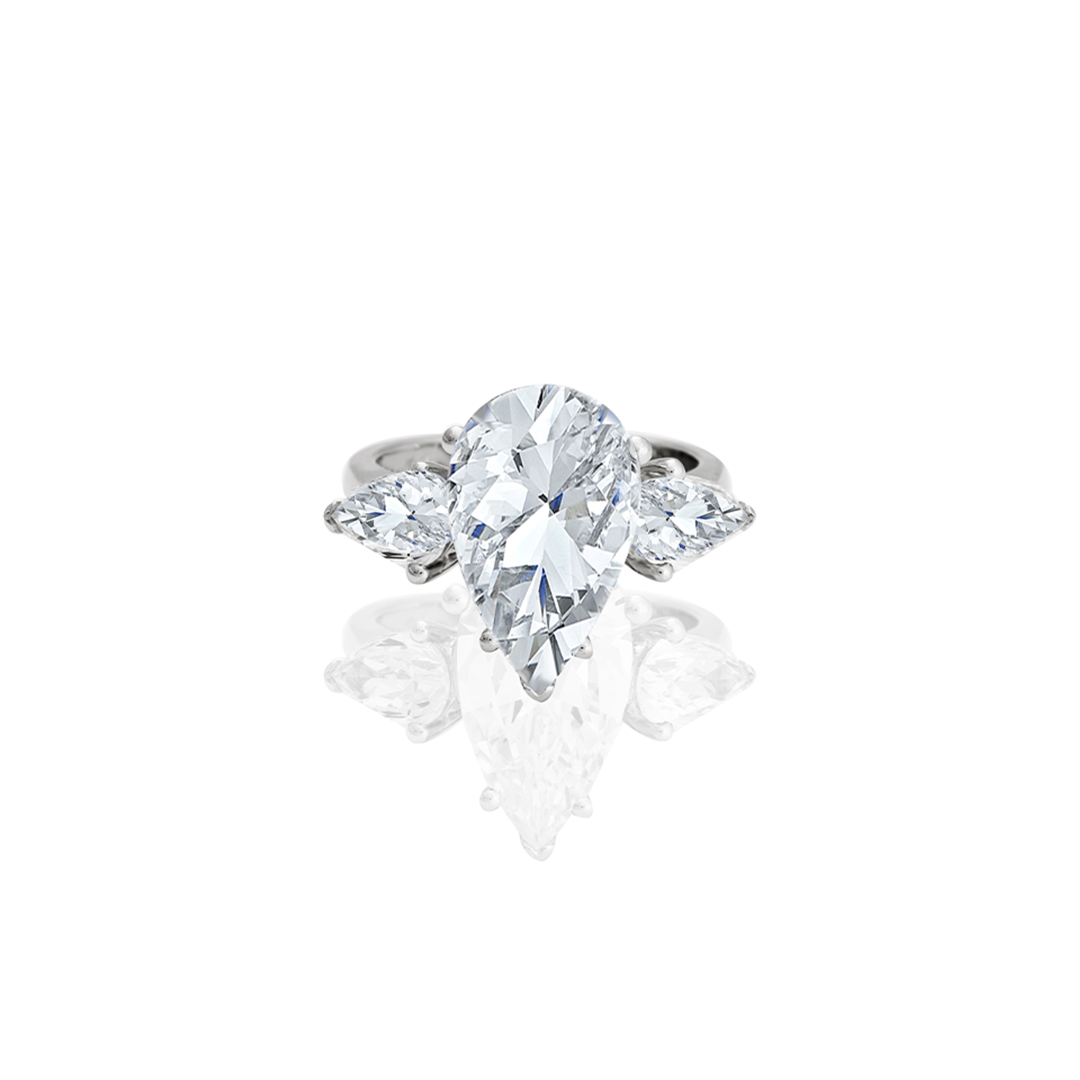 Naina Gold Pear Center Accent Engagement Ring