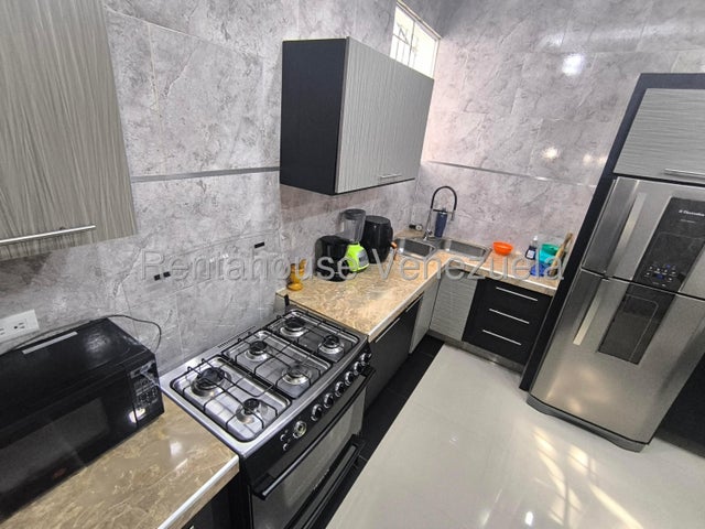 Apartamento planta baja con internet en venta en san blas valencia carabobo codigo 26-16455