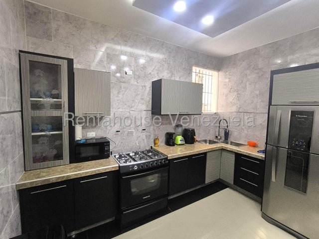 Apartamento planta baja con internet en venta en san blas valencia carabobo codigo 26-16455