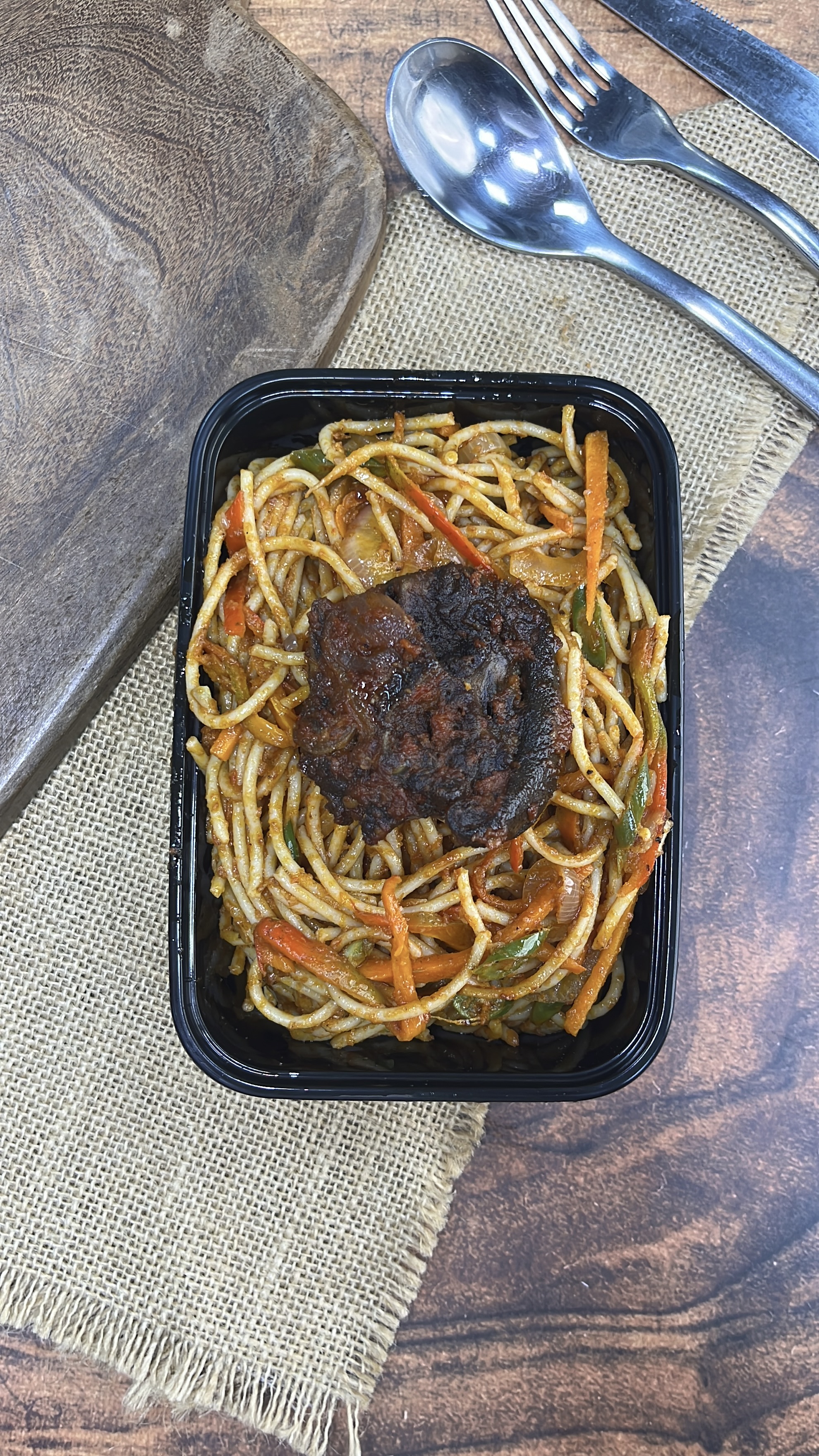 Nourie Jollof Spaghetti