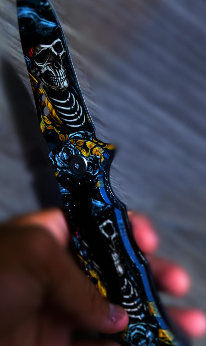 Skull foldable knife