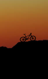Bike sunset mountain