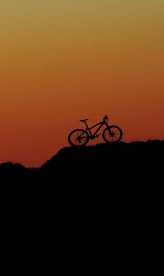 Bike sunset mountain