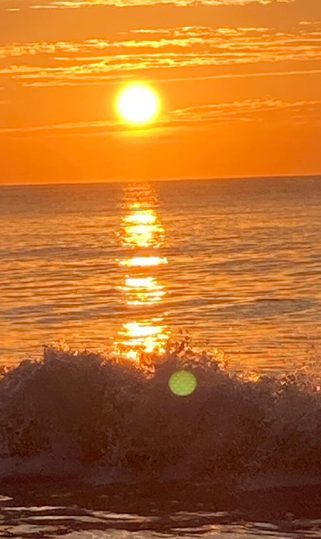 Sunrise by the ocean