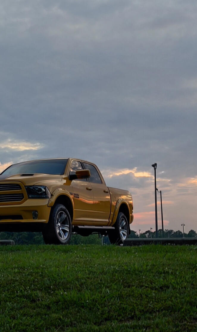 Yellow Ram 1500 truck