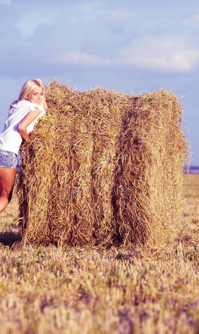 Girl At Hay Rolls