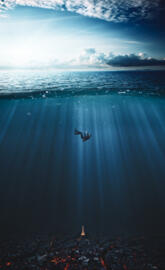 Man sinking in water