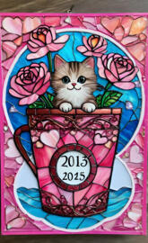 a cat in a heart shaped pillow