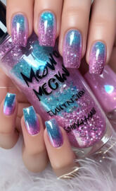 a person's hand with painted fingernails