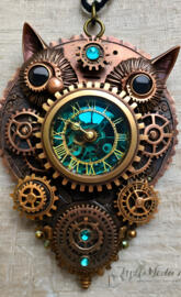 a clock with a weather vane