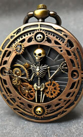 a clock with a skeleton on it