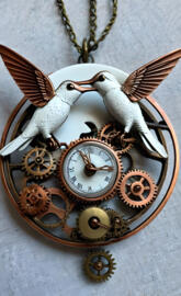 white humming birds and babies