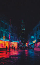 Imagine a cityscape bathed in neon light with streets