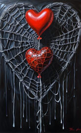 a heart shaped balloon in a net