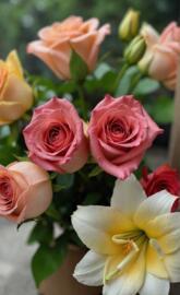 Fresh roses and lilies