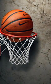 a basketball hoop with a face drawn on it