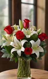 Red roses and white lilies in vase, elegant romance.