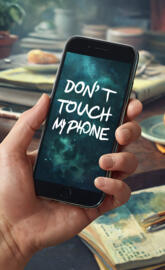 a hand holding a phone