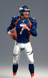 a football player holding a football