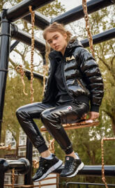 a person sitting on a swing