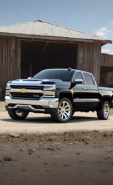 Black 2025 Chevrolet Silverado 4x4 4-door Pickup With Silver Decals.