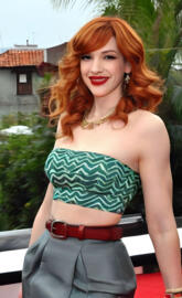 a woman in a green top