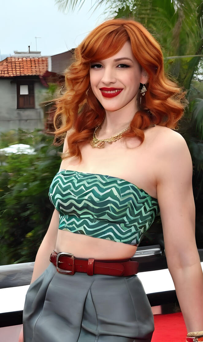 a woman in a green top